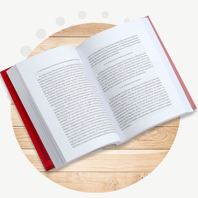 A circle with an open book in the middle of it.